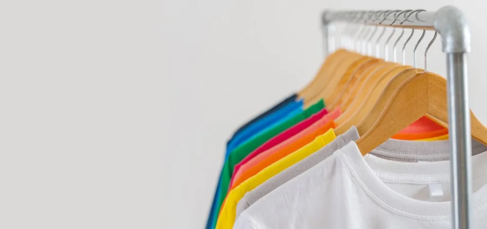 Close Up Of Colorful T Shirts On Hangers, Apparel Background